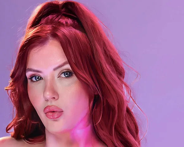 Holly Tanella, founder of Boho, against a lavender backdrop